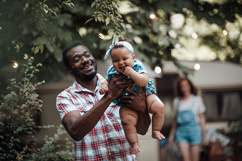 friendly-happy-interracial-family-with-toddler