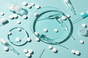 pharmaceutical-drugs-on-the-green-background